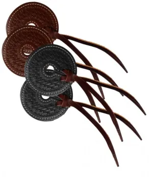 Basket tooled 3" wide leather bit guard with leather strap closure