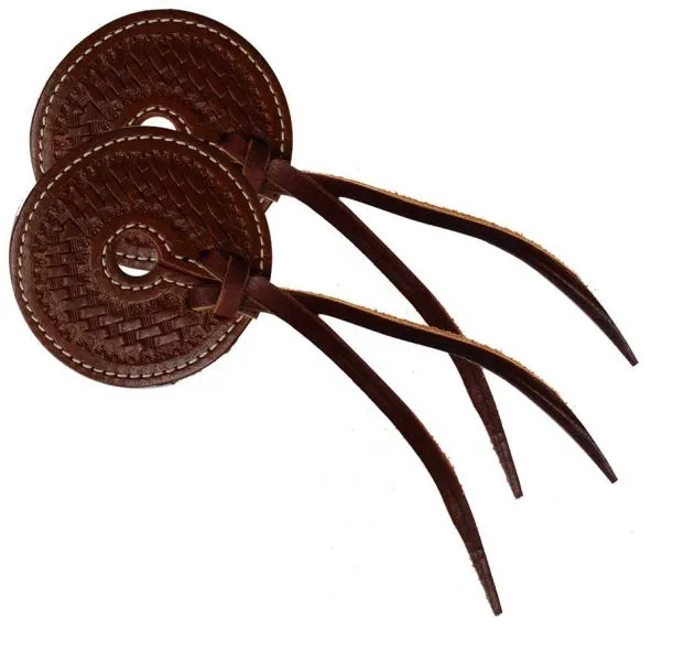 Basket tooled 3" wide leather bit guard with leather strap closure