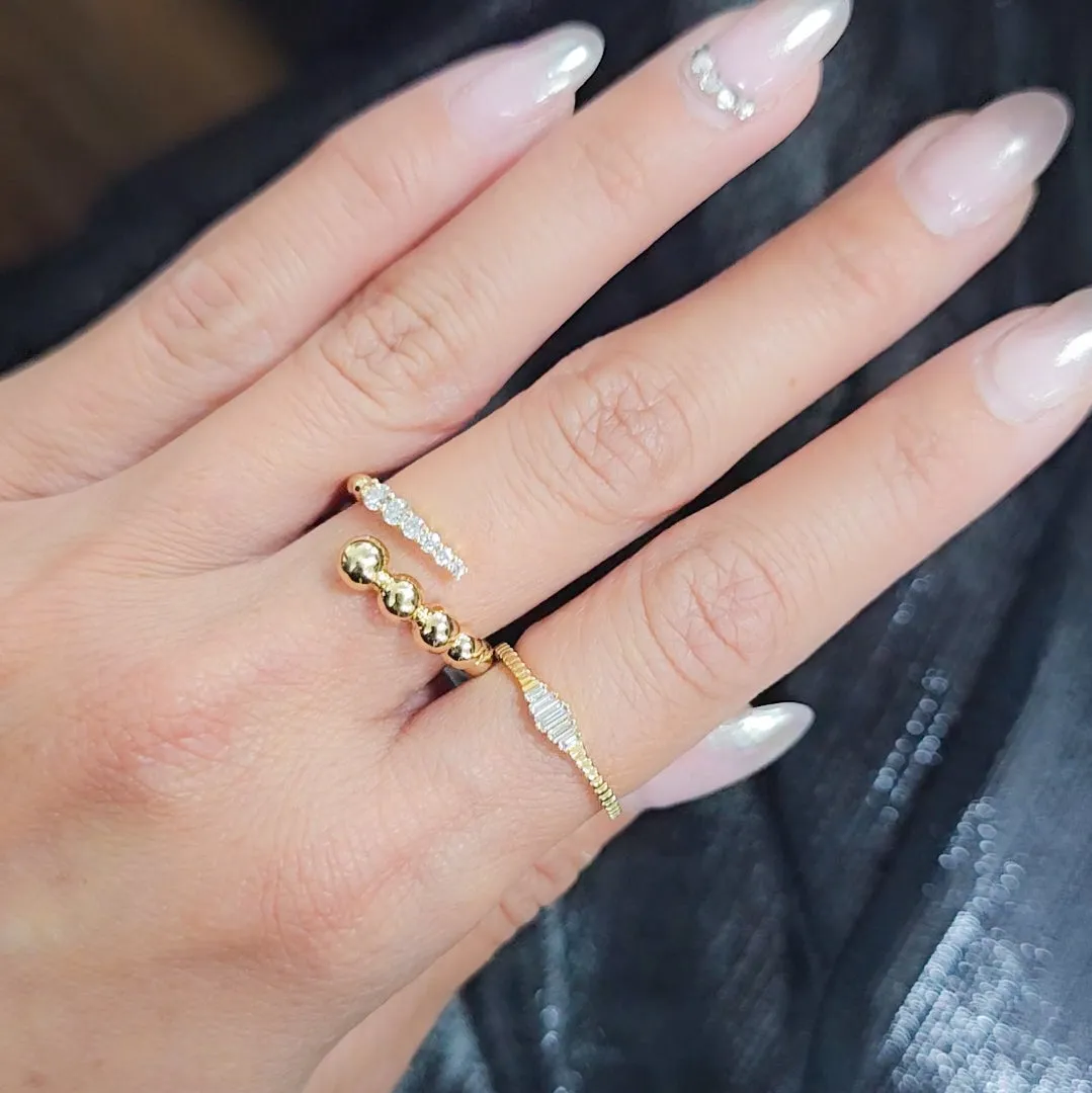 Graduated beaded open diamond ring