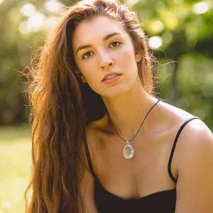 Oval floral bird necklace