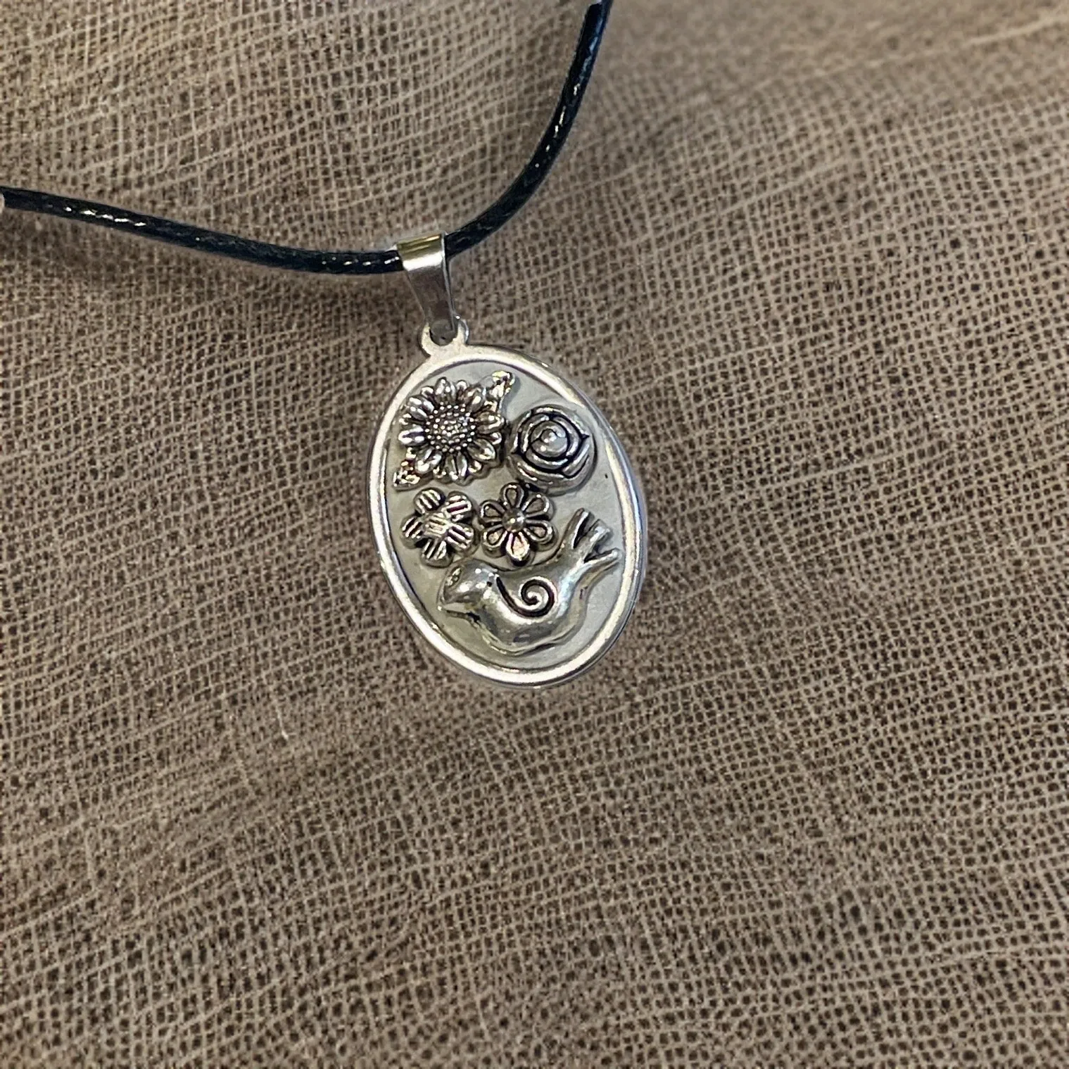 Oval floral bird necklace