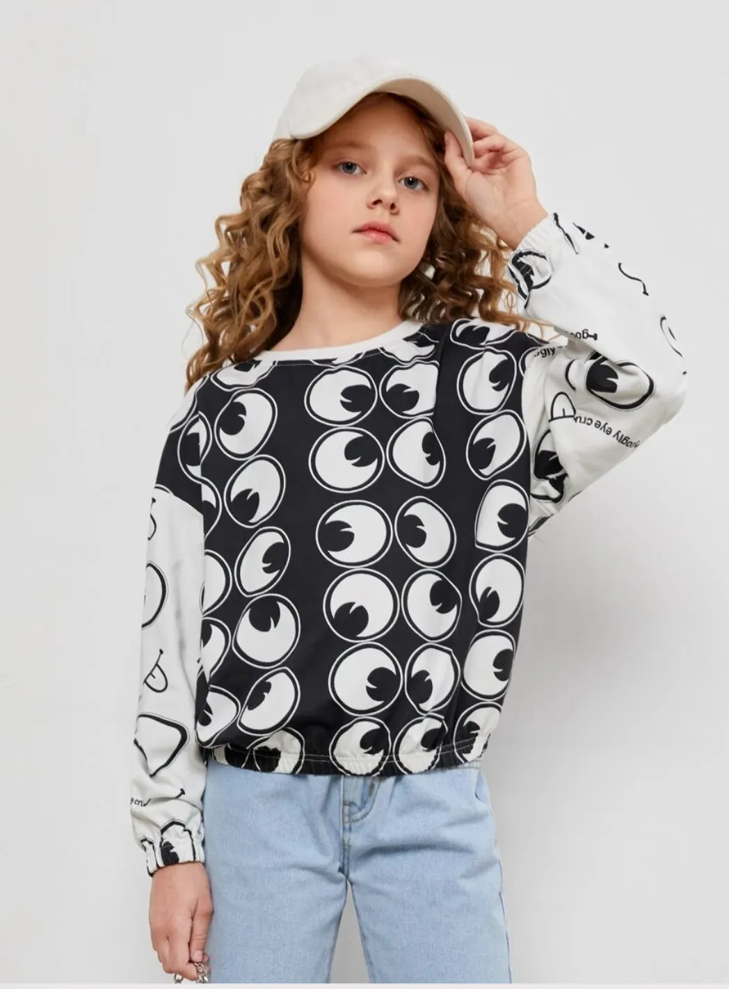 SHEIN X googly eye cry girls allover eyes pullover