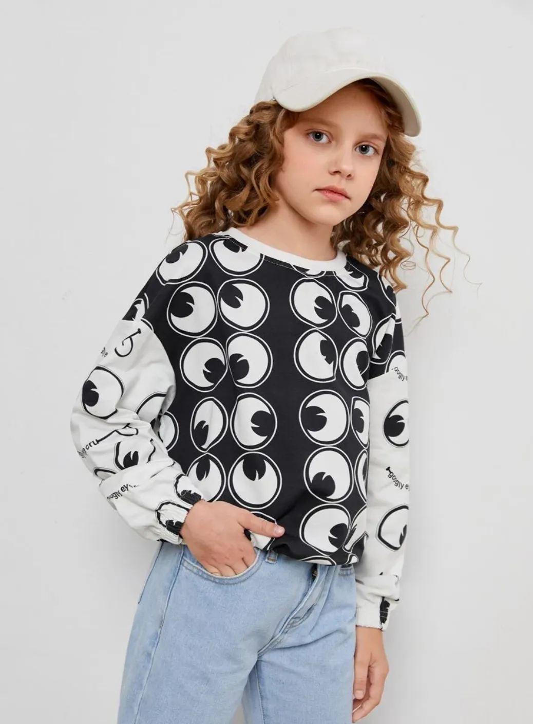 SHEIN X googly eye cry girls allover eyes pullover