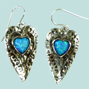 Sterling silver heart earrings set with blue opals.